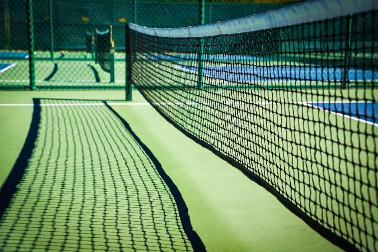 are pickleball nets the same height as tennis nets