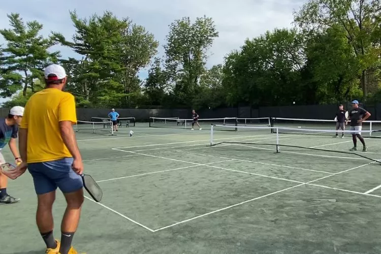 Playing Pickleball on a Clay Court